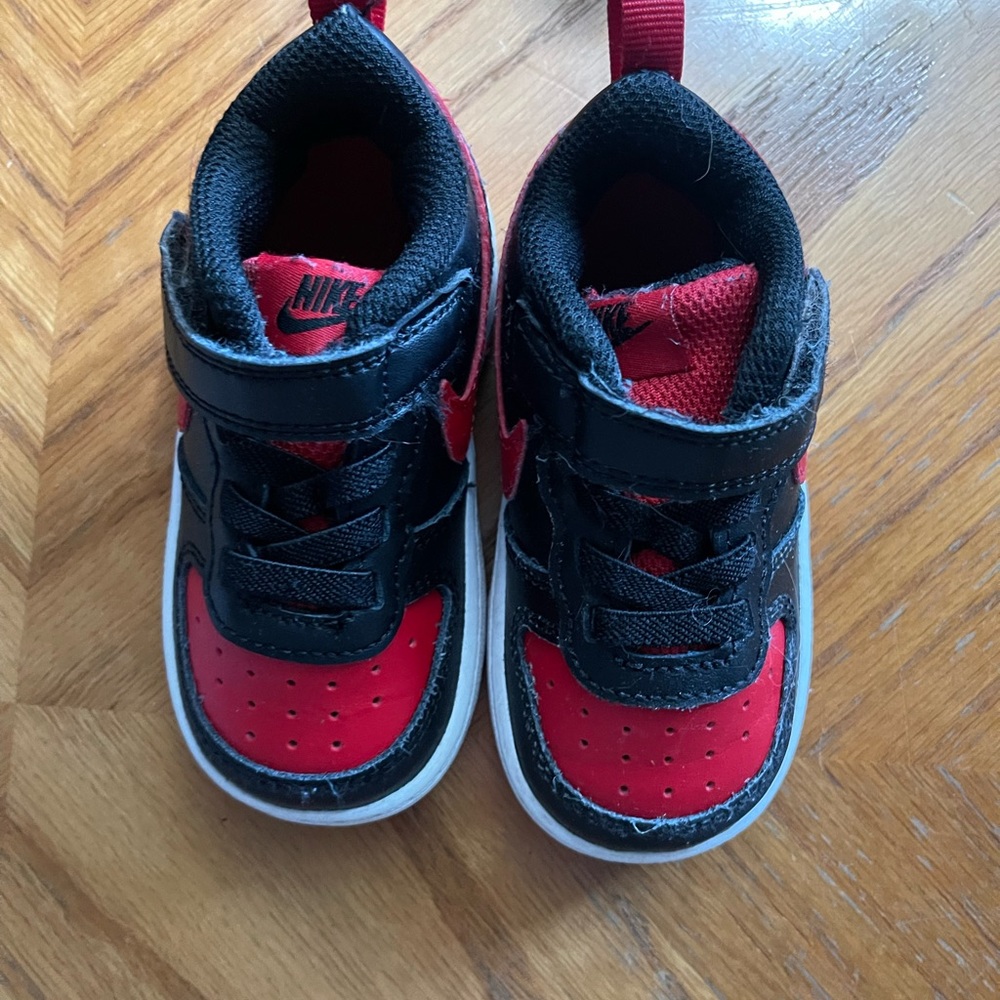 Black and red Nikes